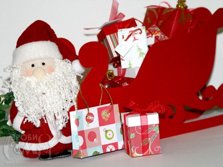 Санта і його сани повні подарунків