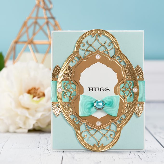 Spellbinders | Chantilly Paper Lace Hugs Card. Project by Yana Smakula using S4-817 Breanna’s Corset Label, S4-819 Lilly Pearl Flat Fold Flower/Border, S5-329 Hannah Elise Layering Frame Small dies. #cardmaking #spellbinders #diecutting