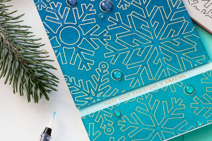 How to create a simple Christmas card with a snowflake background. Handmade card by Yana Smakula using OUTLINE SNOWFLAKES sss101889 and TINY WORDS CHRISTMAS sss101893 #christmascard #cardmaking