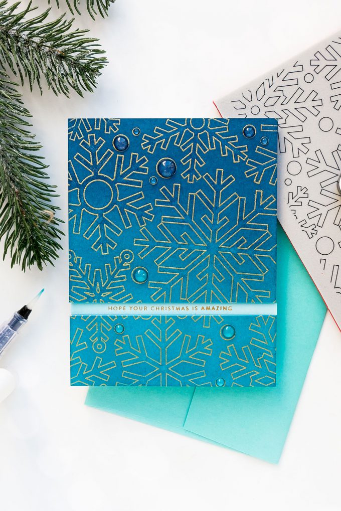 How to create a simple Christmas card with a snowflake background. Handmade card by Yana Smakula using OUTLINE SNOWFLAKES sss101889 and TINY WORDS CHRISTMAS sss101893 #christmascard #cardmaking