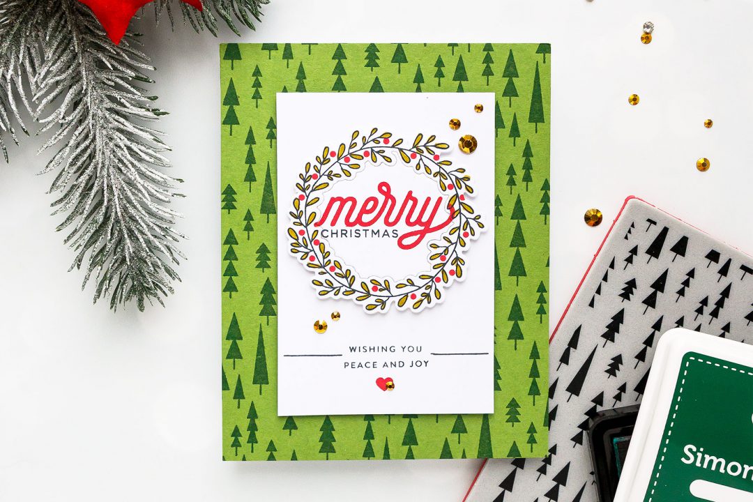 How to make a classic Christmas Wreath Card using stamps & inks. Merry Christmas card by Yana Smakula for Simon Says Stamp #christmascard #DIYChristmasCard