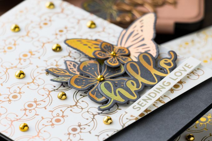 Everyday Foiled Glimmer Cards - More Tips, Tricks & Ideas. Video tutorial by Yana Smakula featuring Spellbinders GLP-141 Glimmering Butterflies Glimmer Hot Foil Plate, GLP-142 Glimmering Layered Flowers Glimmer Hot Foil Plate & Die Set, GLP-143 Hello Dear Friend Glimmer Hot Foil Plate & Die Set