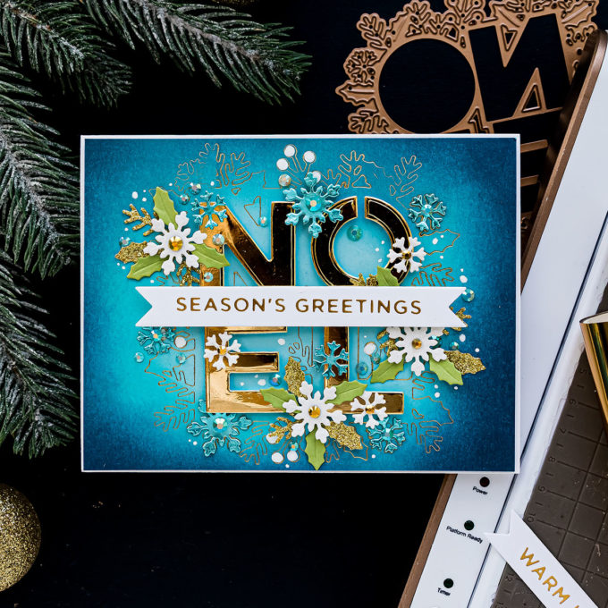 Foiled Christmas Greetings Card - Noel Season's Greetings Card by Yana Smakula featuring S4-1062 Festive Noel Etched Dies from Sparking Christmas Collection #cardmaking #Spellbinders #chritmascard 