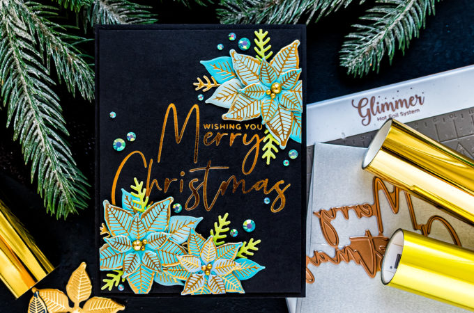 Spellbinders | Foiled Merry Christmas card by Yana Smakula featuring GLP-204 Stylish Script Merry Christmas and GLP-196 Glimmer Poinsettia Glimmer Hot Foil #Spellbinders #NeverStopMaking #Christmascard #GlimmerHotFoilSystem