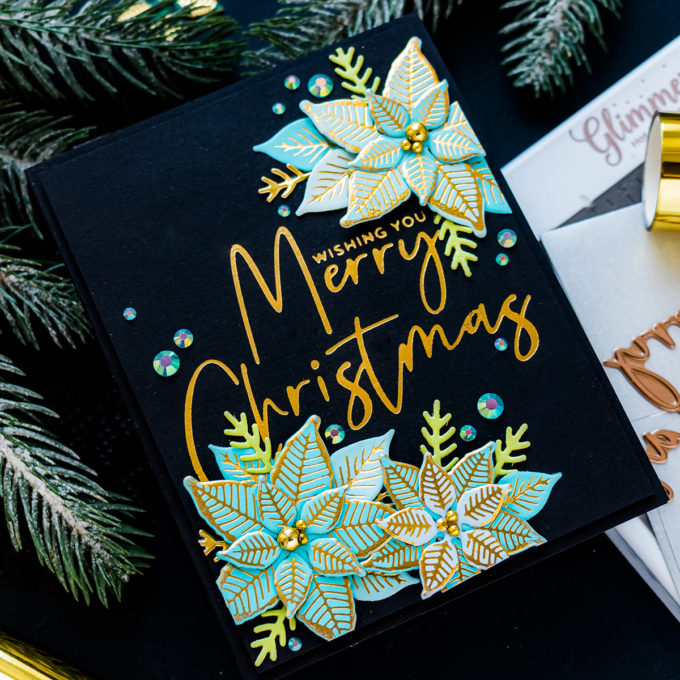 Spellbinders | Foiled Merry Christmas card by Yana Smakula featuring GLP-204 Stylish Script Merry Christmas and GLP-196 Glimmer Poinsettia Glimmer Hot Foil #Spellbinders #NeverStopMaking #Christmascard #GlimmerHotFoilSystem