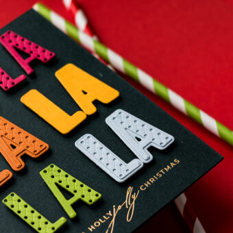 SPOILERS! Spellbinders | 12 Days of Stitch Advent Calendar — Day 7: “Fa La La La"